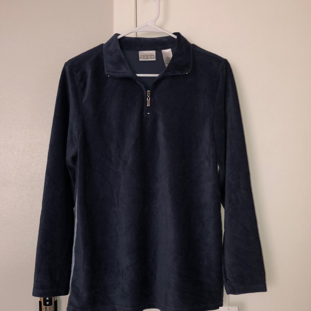 NWT. Soft navy blouse with Velour detail. Beautiful silver pull.